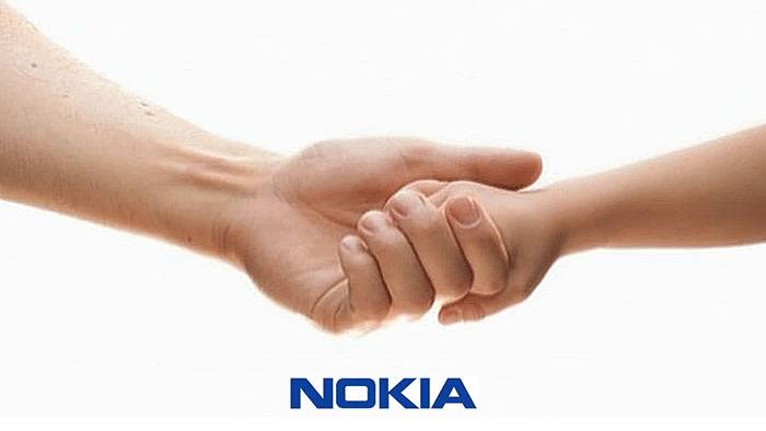 带着它的新机nokia 6,还是那个熟悉的logo,但是经典的握手开机页面